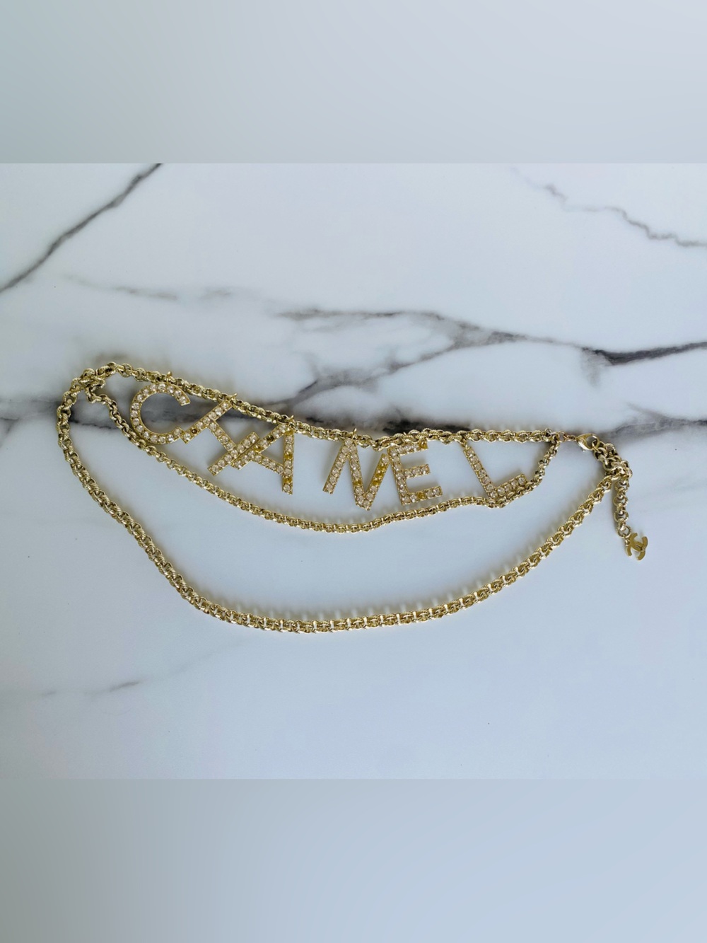 CHANEL gold tone crystal letter belt statement necklace